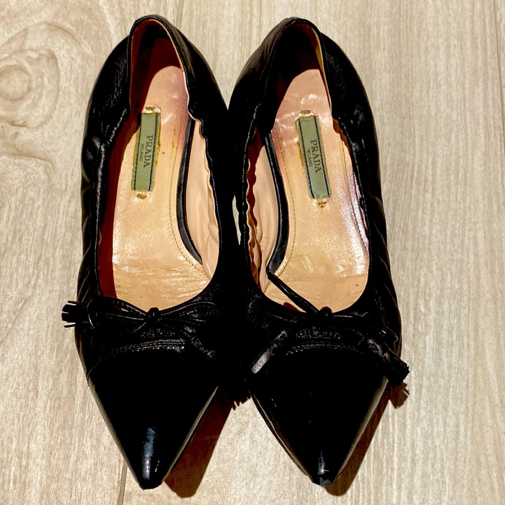 Prada black pointy ballet flats. So comfortable!